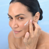 BL+ The Cream Light jar with cream texture on a light blue surface