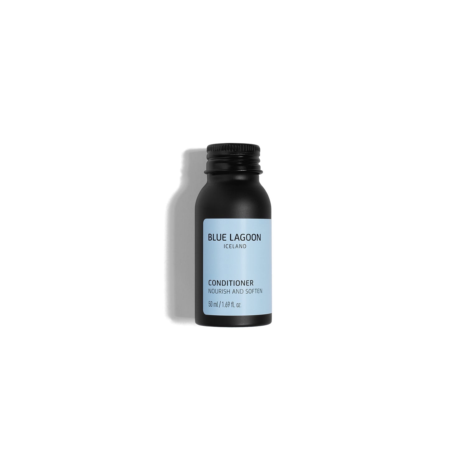 Conditioner travel size bottle on white background